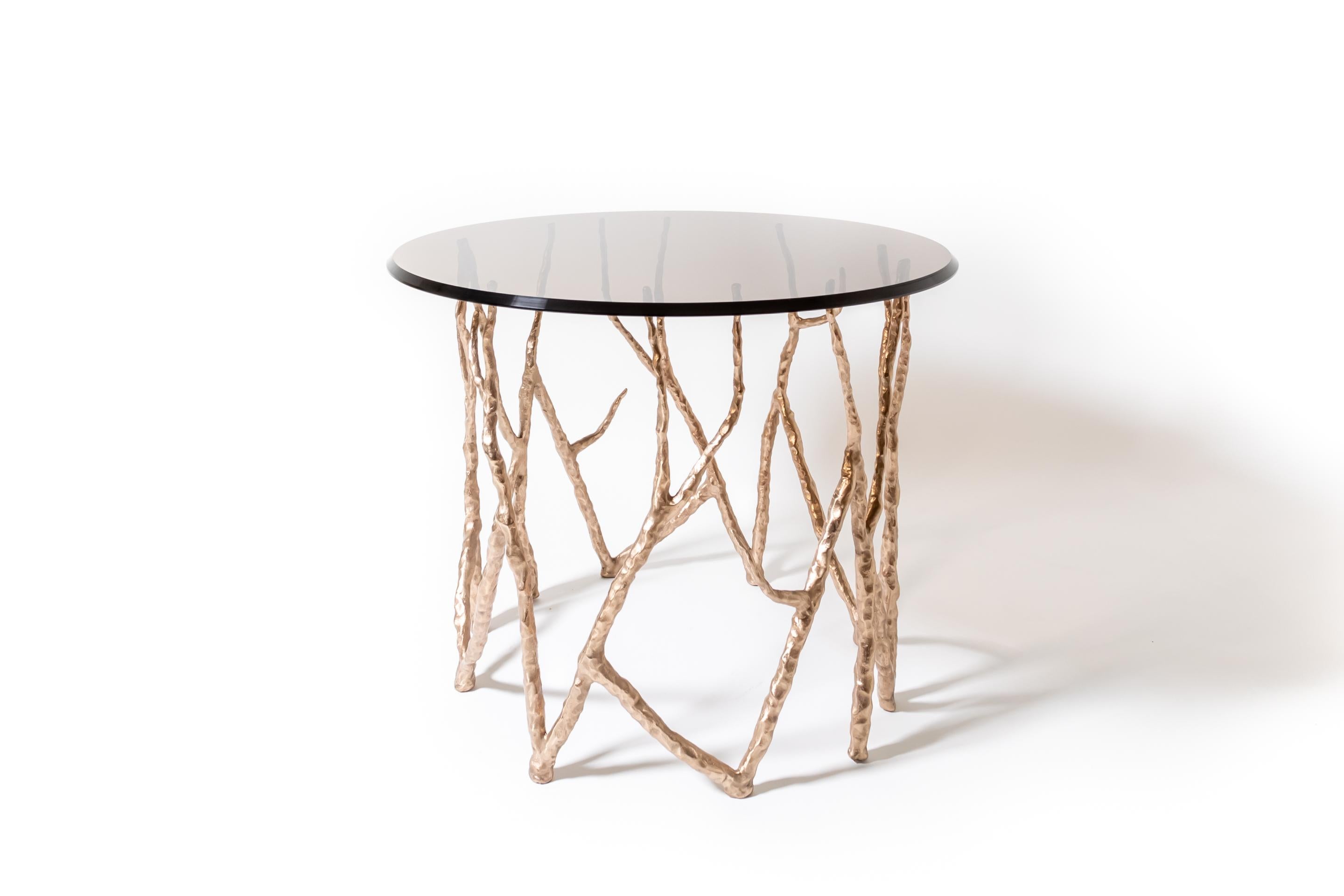 Sculptural and refined, our Wilder Side Table adds a distinctive touch of sophistication to any interior. With its sleek round profile and customizable finishes, this table blends seamlessly into both contemporary and transitional