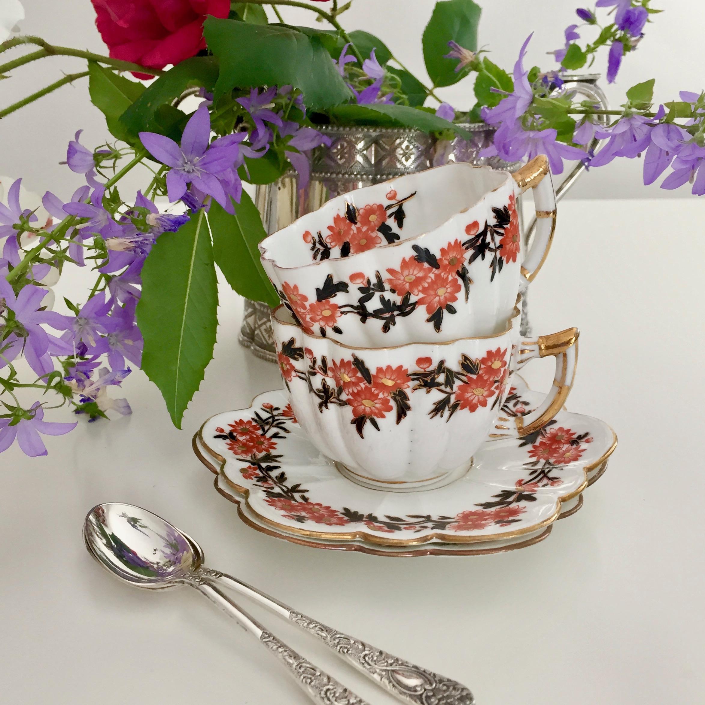 This is a Wileman Daisy shape demitasse cup and saucer with the very endearing 
