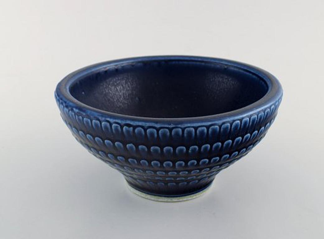 Wilhelm Kåge (1889-1960) for Gustavsberg.
Large bowl of stoneware, decorated with brown and blueish glaze.
Stamped. Gustavsberg Kåge Verkstad.
In perfect condition.
Measures 20.5 cm x 10.5 cm.