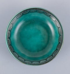 Wilhelm Kåge for Gustavsberg, a set of five small "Argenta" ceramic bowls.