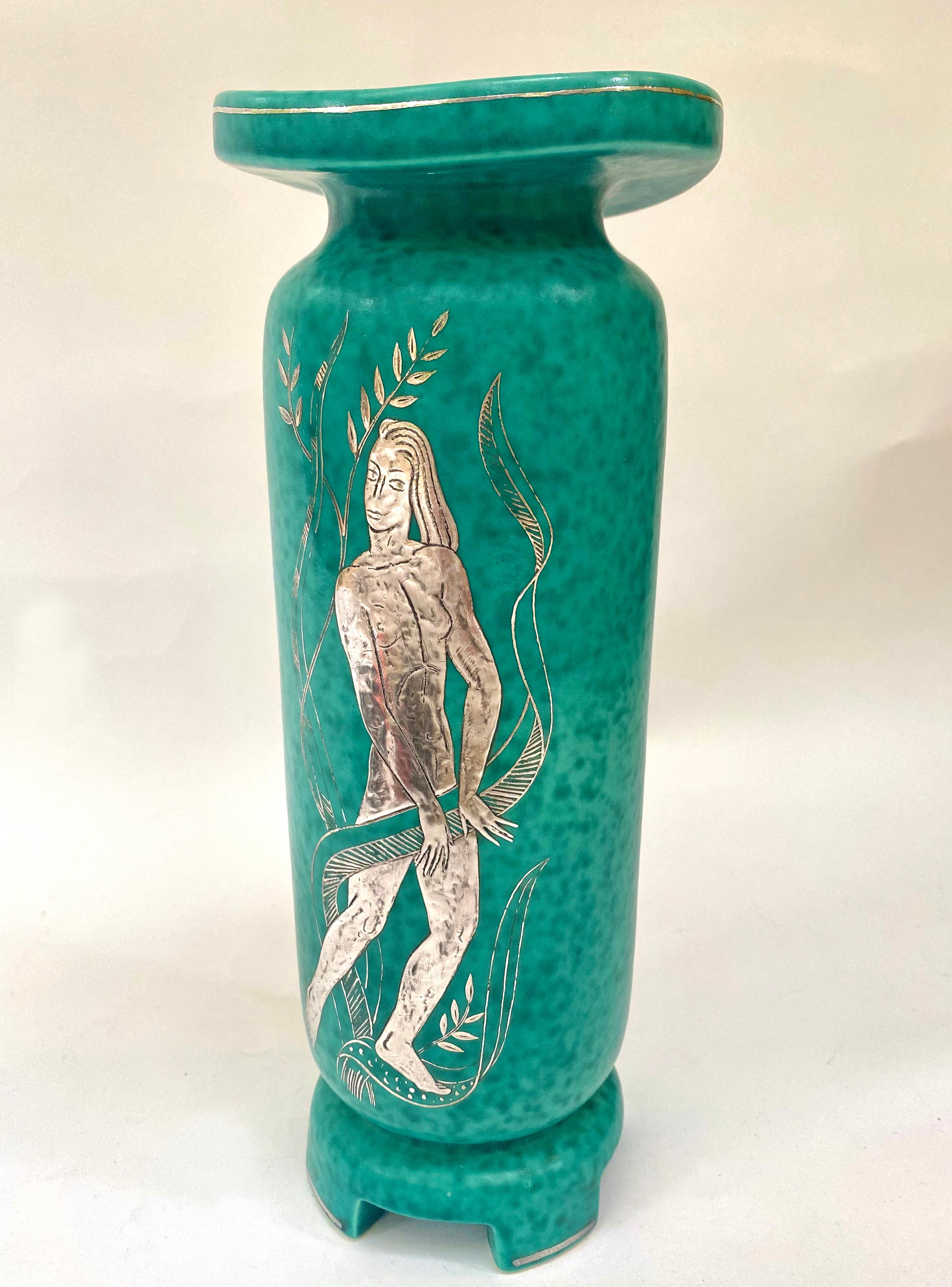 Incredible and large 1930s Wilhem Kage (1889-1960) Argenta Vase by Gustavsberg which is double sided. The top is a cool optical illusion of both round and slightly rectangular. Beautiful Siren in the underwater foliage with a rare base. Signed.