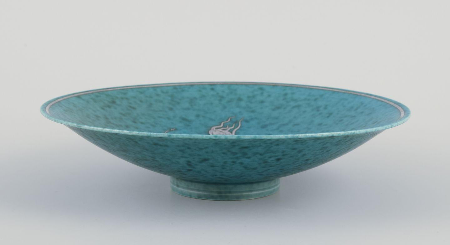 I PRODOTTI USATI SONO ESENTI DA TARIFFE DI IMPORTAZIONE PER I CLIENTI STATUNITENSI, BRITANNICI, AUSTRALIANI E CANADESI.   
PERTANTO, AL TUO ACQUISTO NON SI APPLICHERANNO TARIFFE DI IMPORTAZIONE. 

Wilhelm Kåge per Gustavsberg.
Ciotola in ceramica