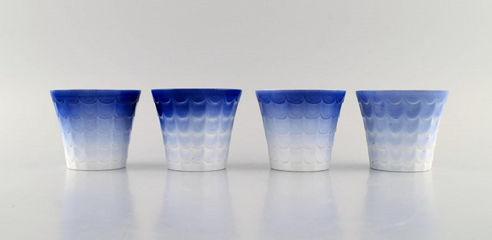 Wilhelm Kåge for Gustavsberg. Four Art Deco herb pots in glazed porcelain. 
Swedish design, 1960s.
Measures: 8,5 x 7,5 cm.
In excellent condition.
Stamped.