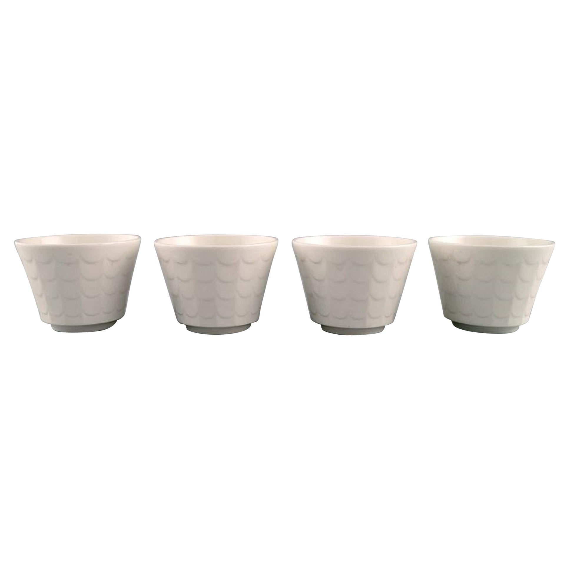Wilhelm Kåge pour Gustavsberg, quatre cache-pots en porcelaine, années 1960