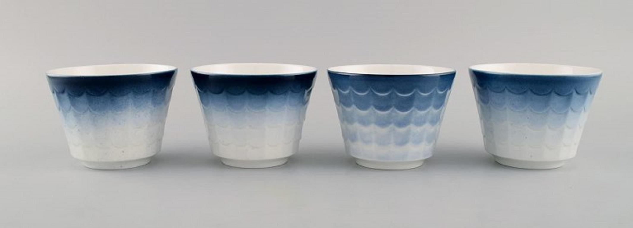 Wilhelm Kåge for Gustavsberg. Four flower pot covers in porcelain. Swedish design, 1960s.
Measures: 10,5 x 8 cm.
In excellent condition.
Stamped.