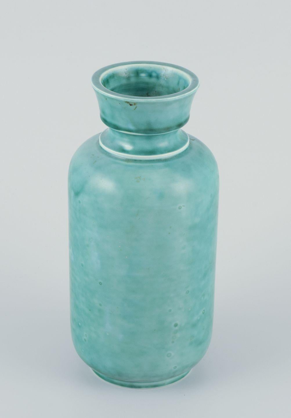 PRE-OWNED GOODS ARE EXEMPT FROM IMPORT TARIFFS FOR U.S., UK, AUSTRALIAN & CANADIAN CUSTOMERS.   
THEREFORE, NO IMPORT TARIFFS WILL BE APPLICABLE TO YOUR PURCHASE. 

Wilhelm Kåge for Gustavsberg, large stoneware vase.
“Argenta” series. Hand-turned,