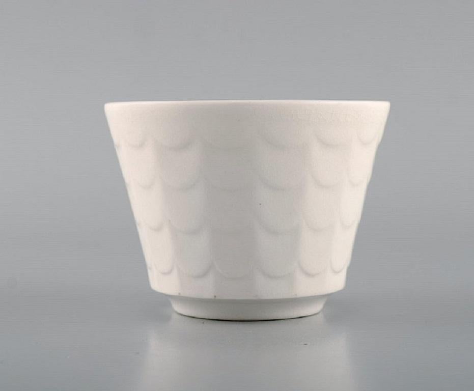 Wilhelm Kåge for Gustavsberg. Six flower pot covers in porcelain. Swedish design, 1960s.
Measures: 8 x 6 cm.
In excellent condition.
Stamped.