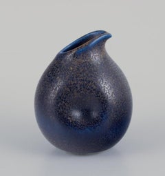 Wilhelm Kåge for Gustavsberg, Sweden. Small pitcher and salt shaker in ceramic.