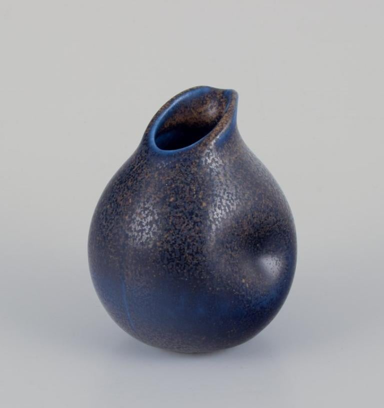 Scandinavian Modern Wilhelm Kåge for Gustavsberg, Sweden. Small pitcher and salt shaker in ceramic.  For Sale