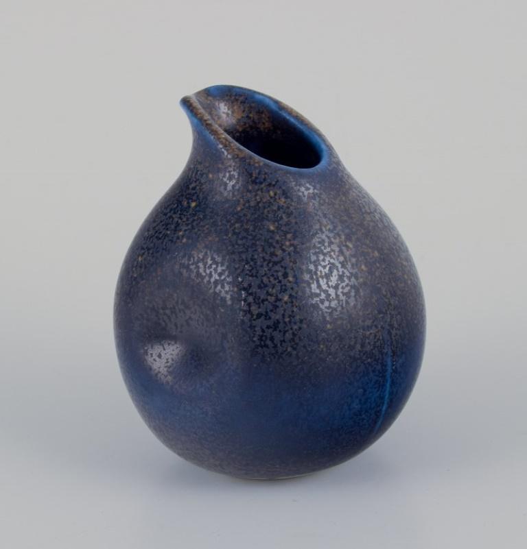 Swedish Wilhelm Kåge for Gustavsberg, Sweden. Small pitcher and salt shaker in ceramic.  For Sale