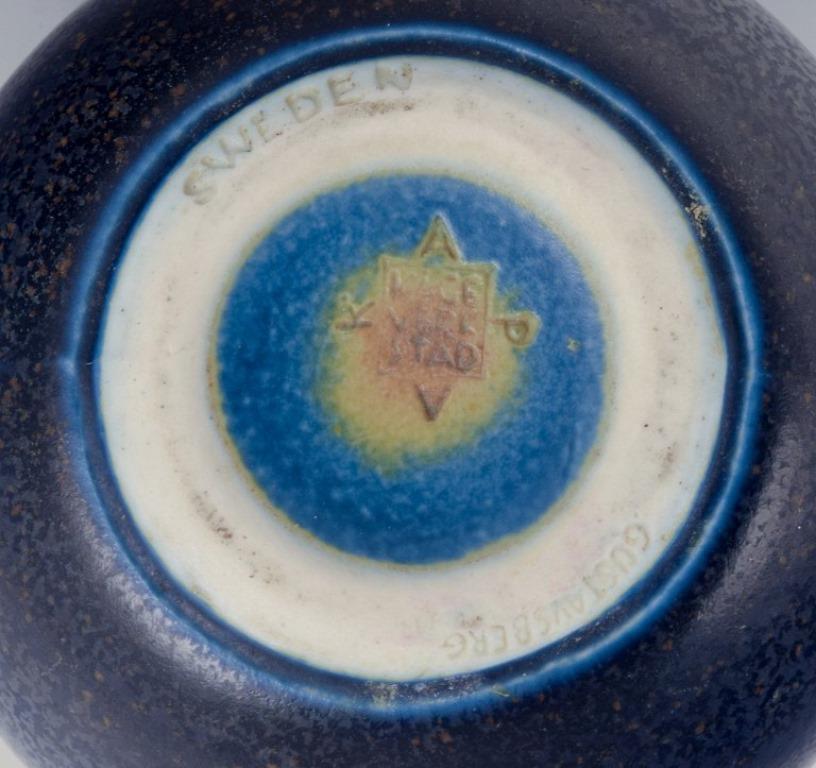 Glazed Wilhelm Kåge for Gustavsberg, Sweden. Small pitcher and salt shaker in ceramic.  For Sale