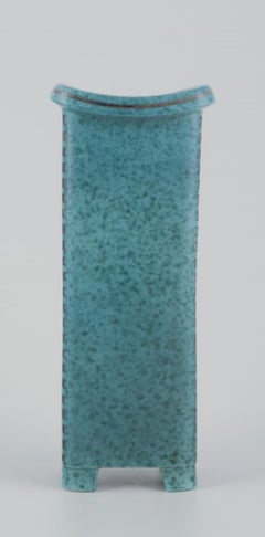 Wilhelm Kåge for Gustavsberg. Tall square Art Deco ceramic vase on feet.