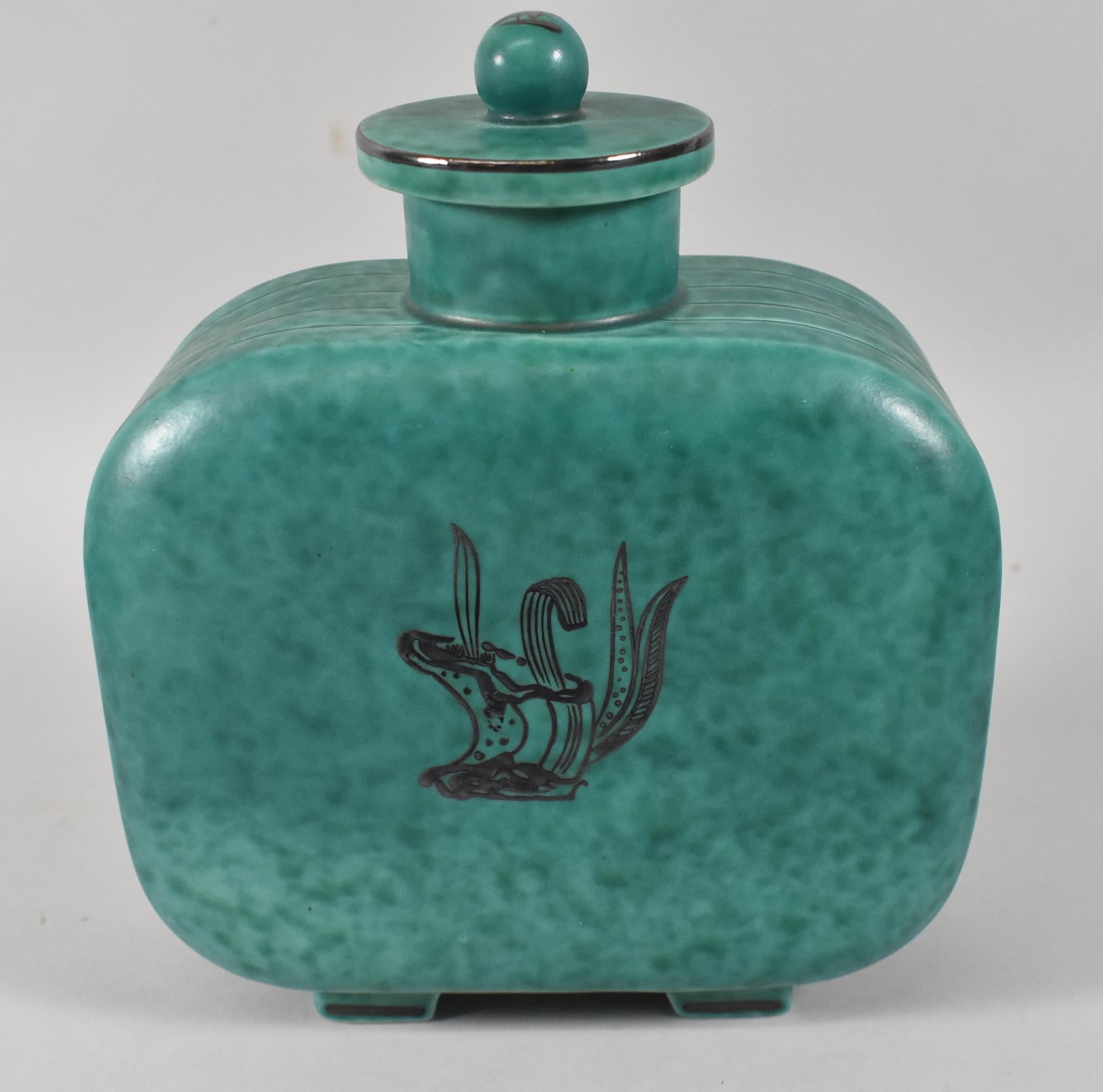 ​A fabulous green Argenta vase with overlaid silver design of a woman seated amongst aquatic flora. Designed by Wilhelm Kage (1889-1960) stamped on the base Gustavsberg Sweden, 1144, this piece dates from the early 20th Century, circa 1930's.   7.5