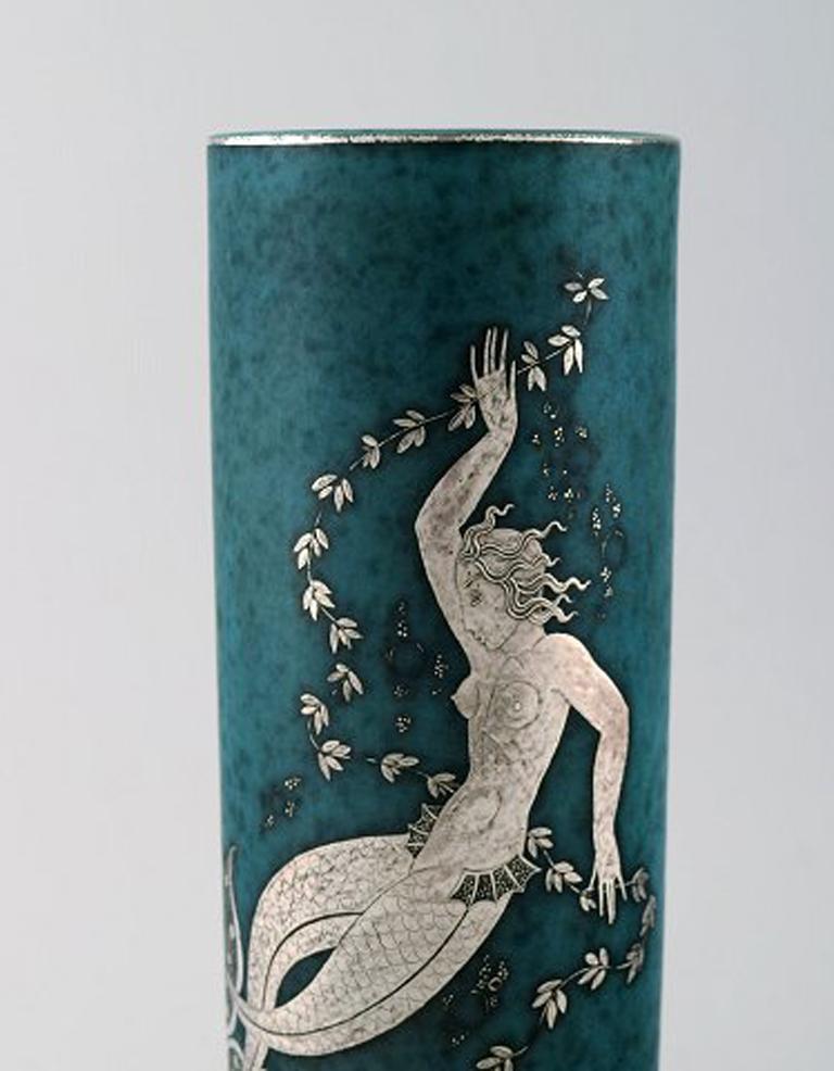 Wilhelm Kåge/Kaage, Gustavsberg, Argenta vase decorated with mermaid
Height 23,5 cm. x 8 cm.
Marked Gustavsberg, Argenta.
In perfect condition.