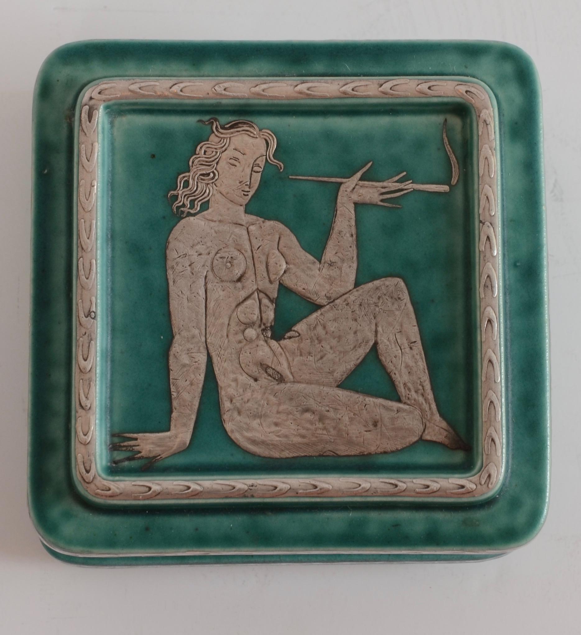 Ceramic lid box with silver details, designed by Wilhelm Kåge for Gustavsberg, mid-1900s.