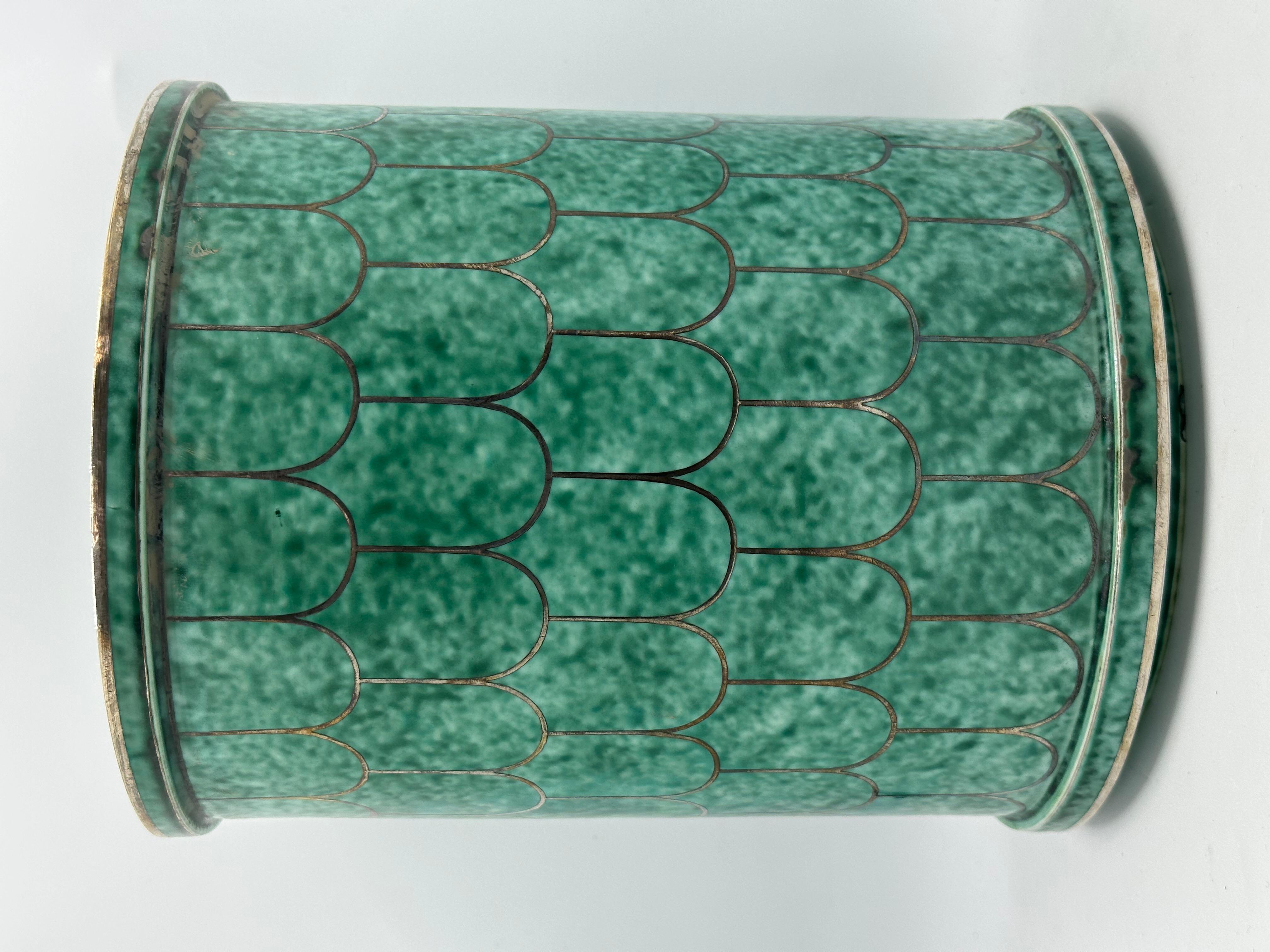 Wilhelm Kage Pot 'Argenta' for Gustavsberg Sweden 1950 Signed 
Rare model that can be a planter, with modern silver decor in shape of utilized sales.
Good condition
The Argenta sandstone collection, now emblematic with its green glaze and silver