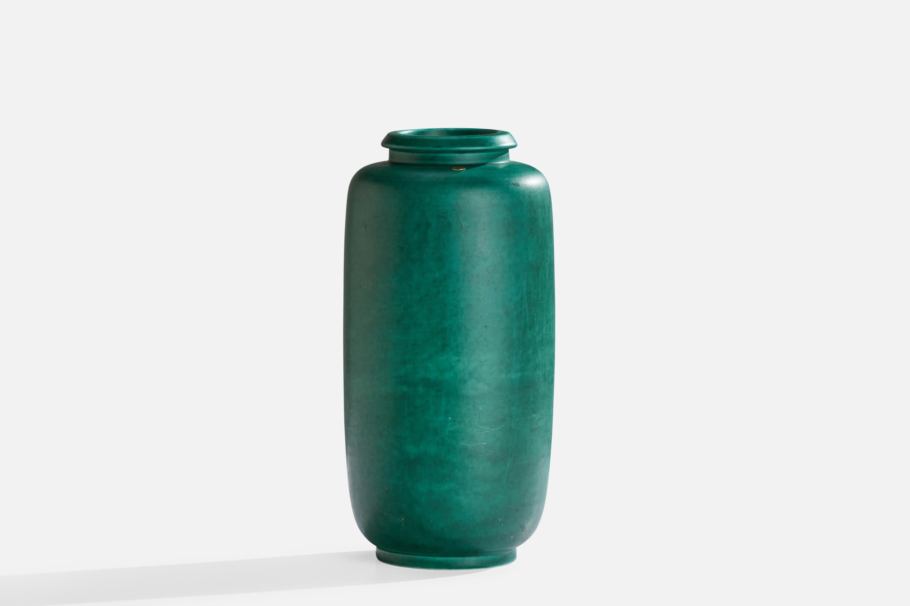 A green-glazed stoneware vase designed by Wilhelm Kåge and produced by Gustavsberg, Sweden, c. 1950s.