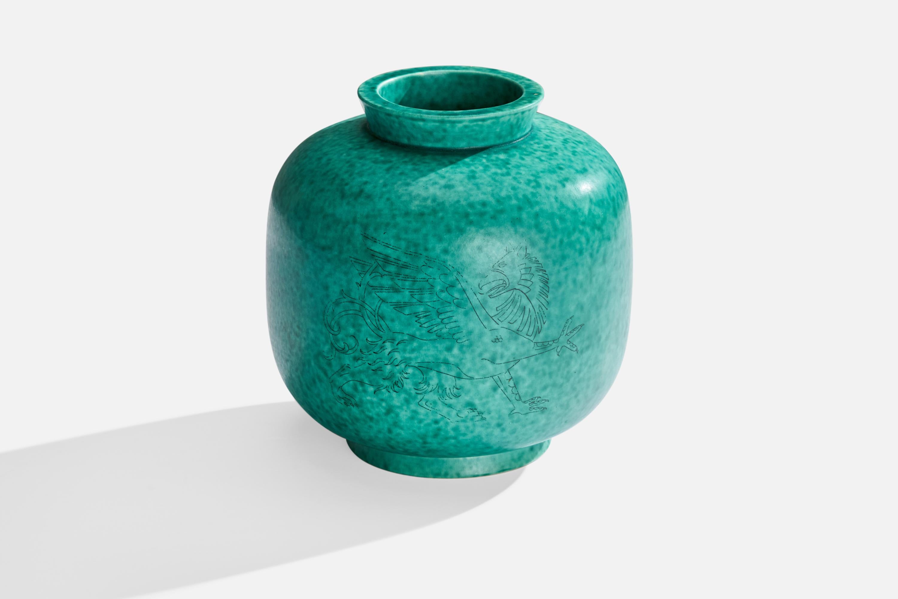 A green-glazed stoneware vase designed by Wilhelm Kåge and produced by Gustavsberg, Sweden, c. 1950s.