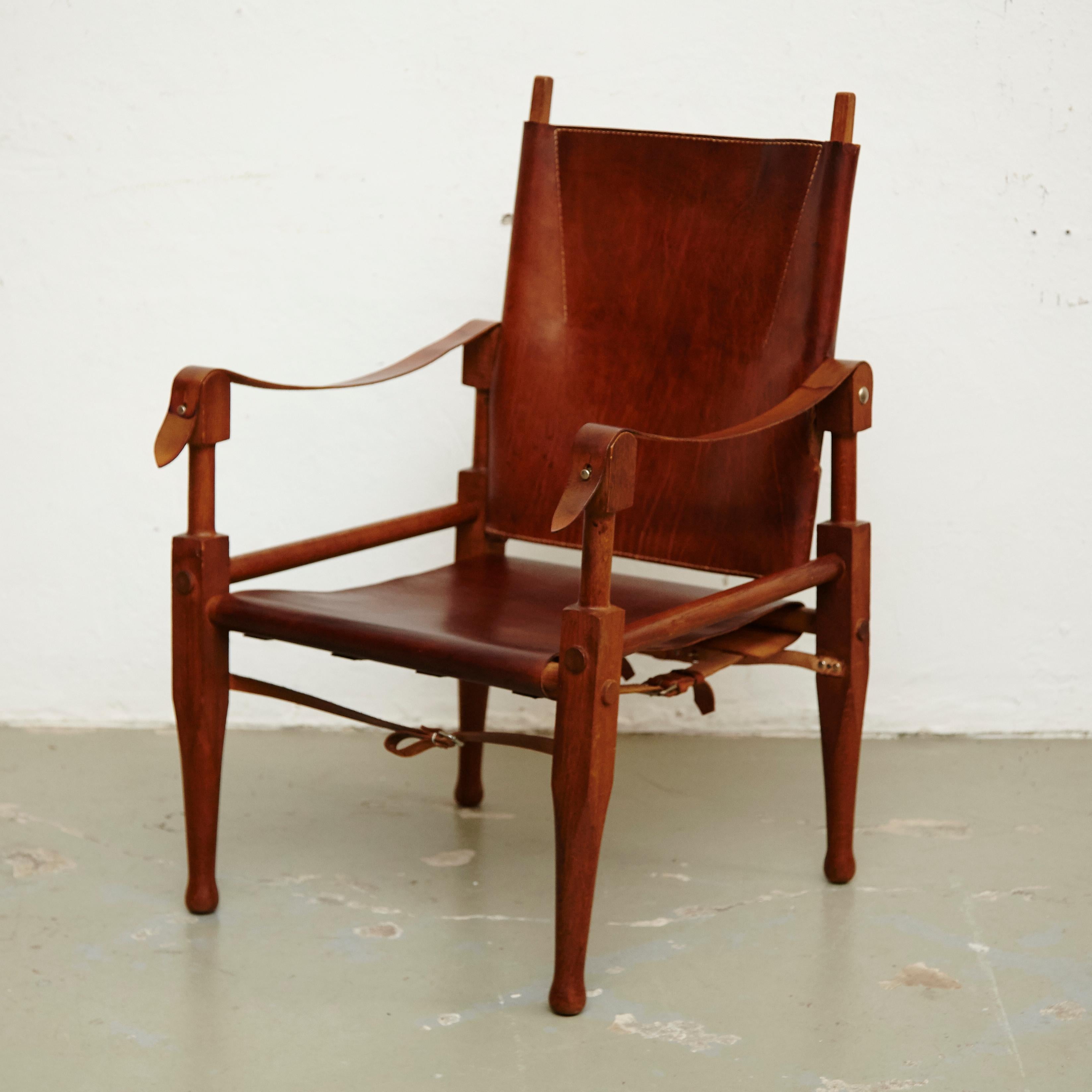 Armchair designed by Wilhelm Kienzle manufactured in Switzerland, circa 1960.

Leather Safari armchair
Measures: 90 x 56 x 56 cm

In good original condition with minor wear consistent with age and use, preserving a beautiful patina.

 