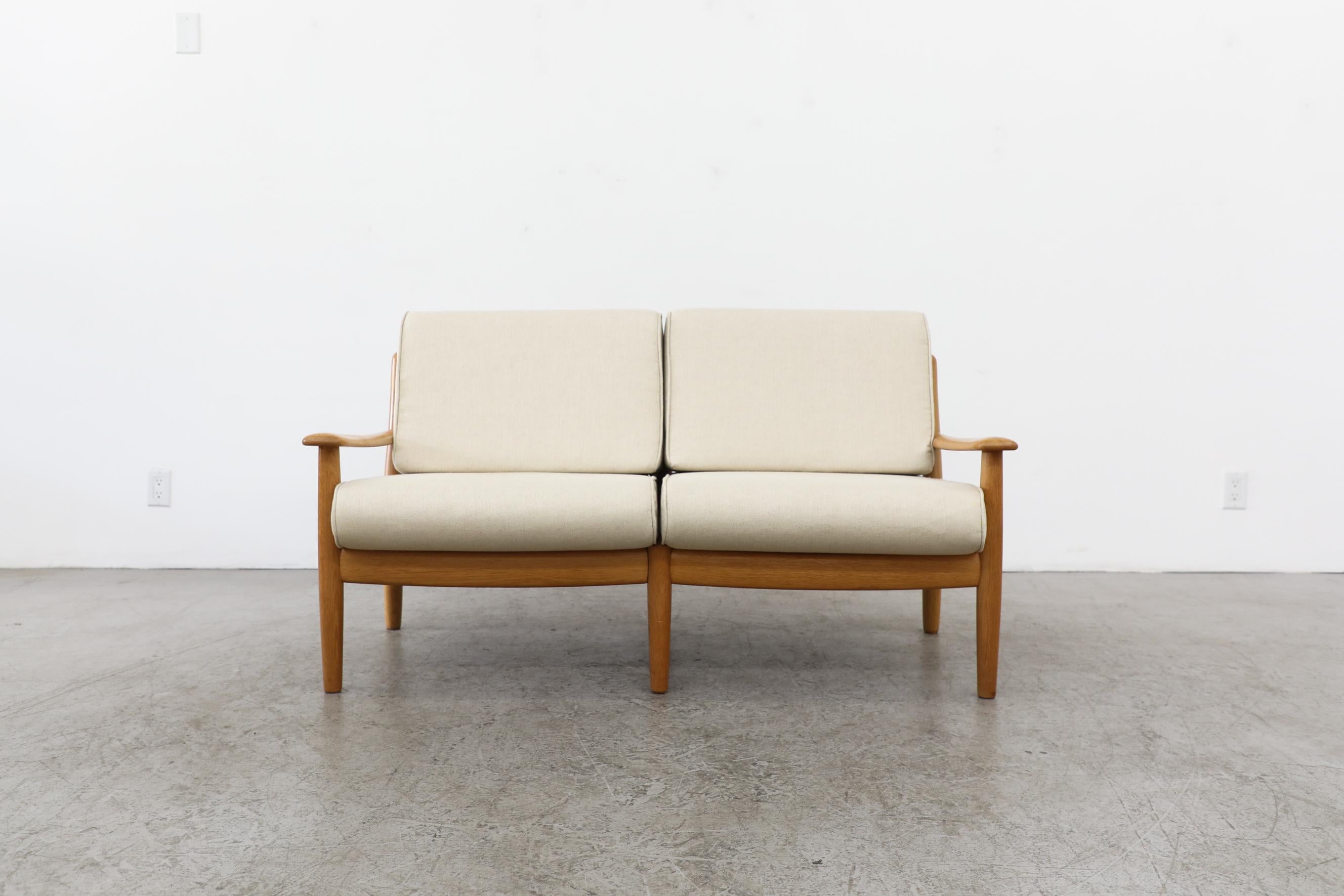 Wilhelm Knoll Oak Loveseat with Rounded Edges & Cream Cushions, Germany, 1960's In Good Condition For Sale In Los Angeles, CA