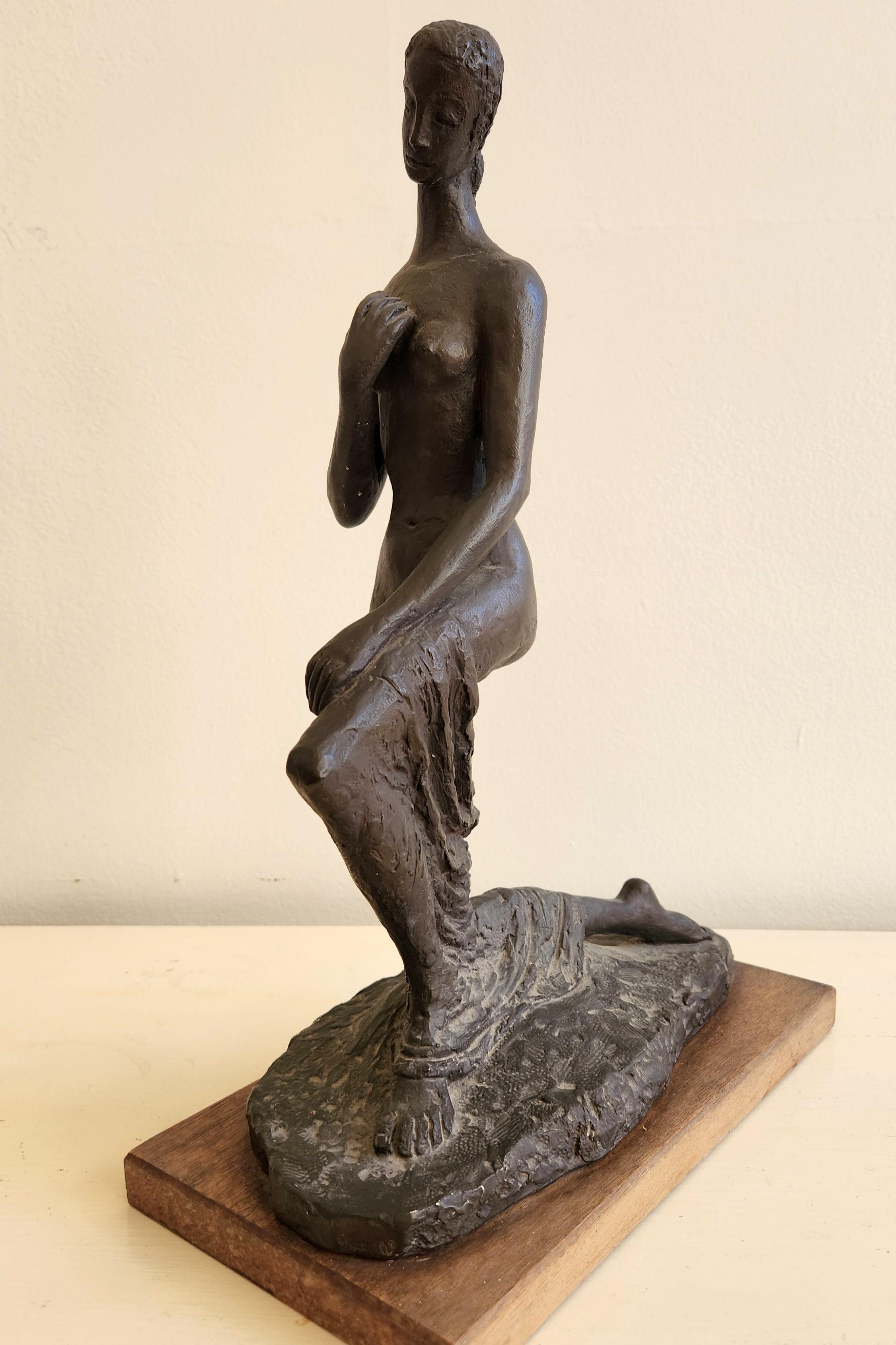 kneeling woman sculpture