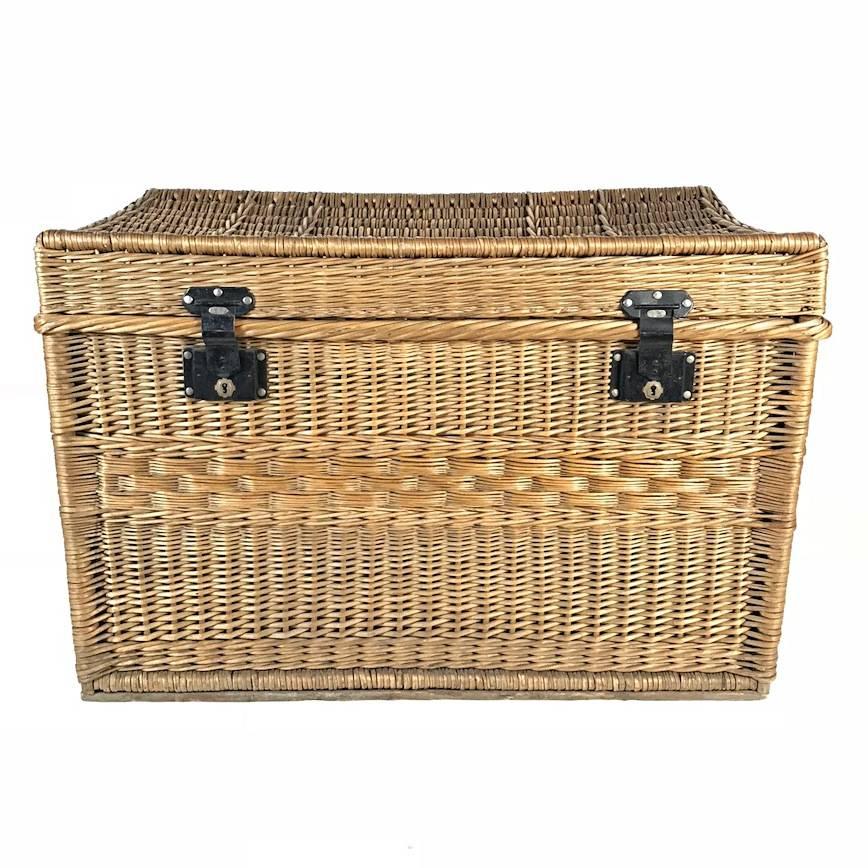 Early unique wicker trunk handmade by Wilhelm Melzer in Vienna, Austria. The woven willow wicker trunk has a lid, two metal locks and two handles. The basket is in excellent condition with nice patina. It was used as a blanket chest.

-Thank you for