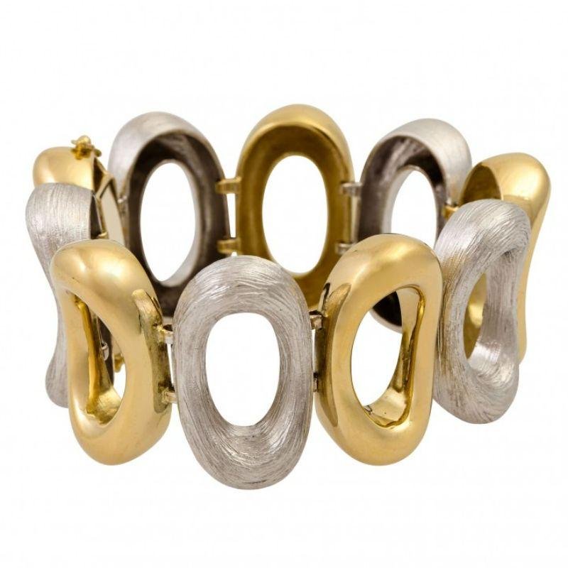 Poliert, satiniert, GG/WG 14k, 95,8 g, 1960er Jahre, minimale Spuren, mit Kastenschloss und 2x Sicherheitsnacht.

 Armband, poliert, seidenmatt, 14k YG/WG, 95.8 G, um 1960, minimale Gebrauchsspuren, Kastenschließe mit 2x Sicherheitsverschluß.