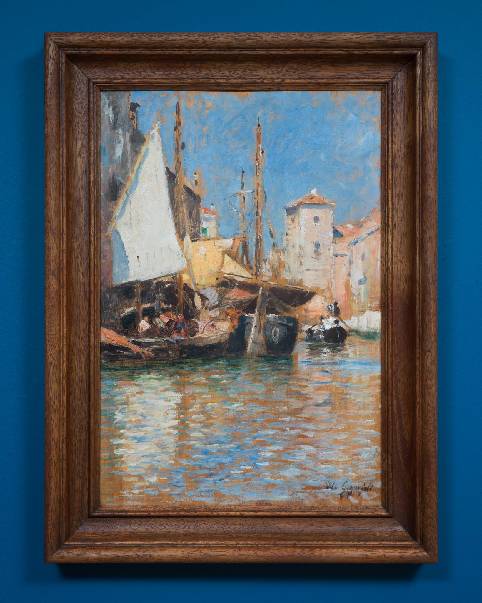 In questa luminosa scena di canale, dipinta durante il suo soggiorno a Venezia all'inizio degli anni '80 del XIX secolo, Wilhelm von Gegerfelt cattura l'atmosfera vivida e la luce abbagliante della città con notevole immediatezza. Eseguito con
