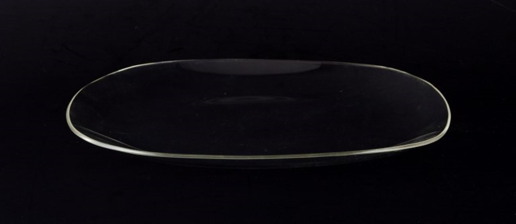 German Wilhelm Wagenfeld (1900-1990). Set of eight Bauhaus plates in clear art glass For Sale