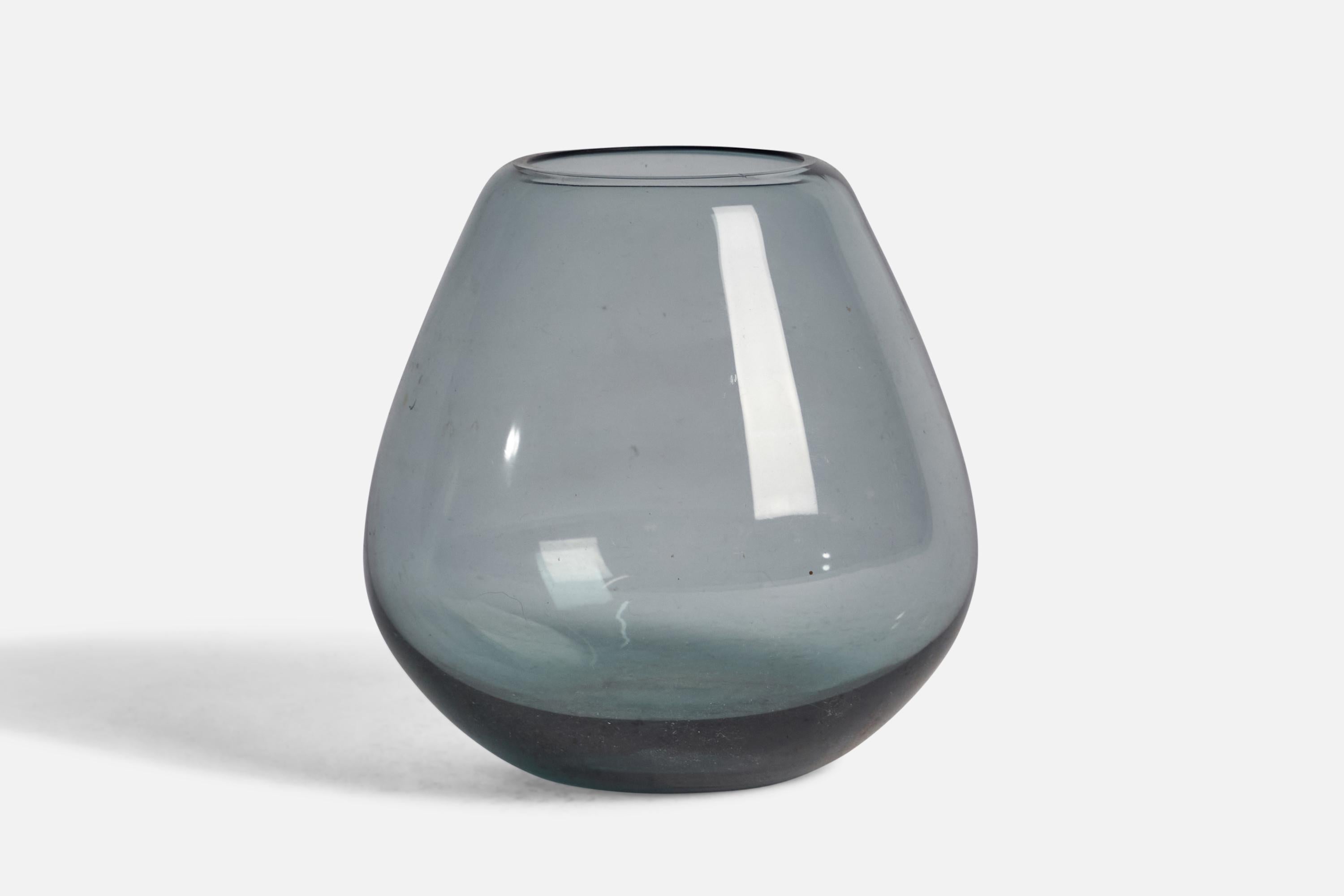 A blue-coloured glass vase designed by Wilhelm Wagenfeld and produced by WMF, Germany, c. 1950s.