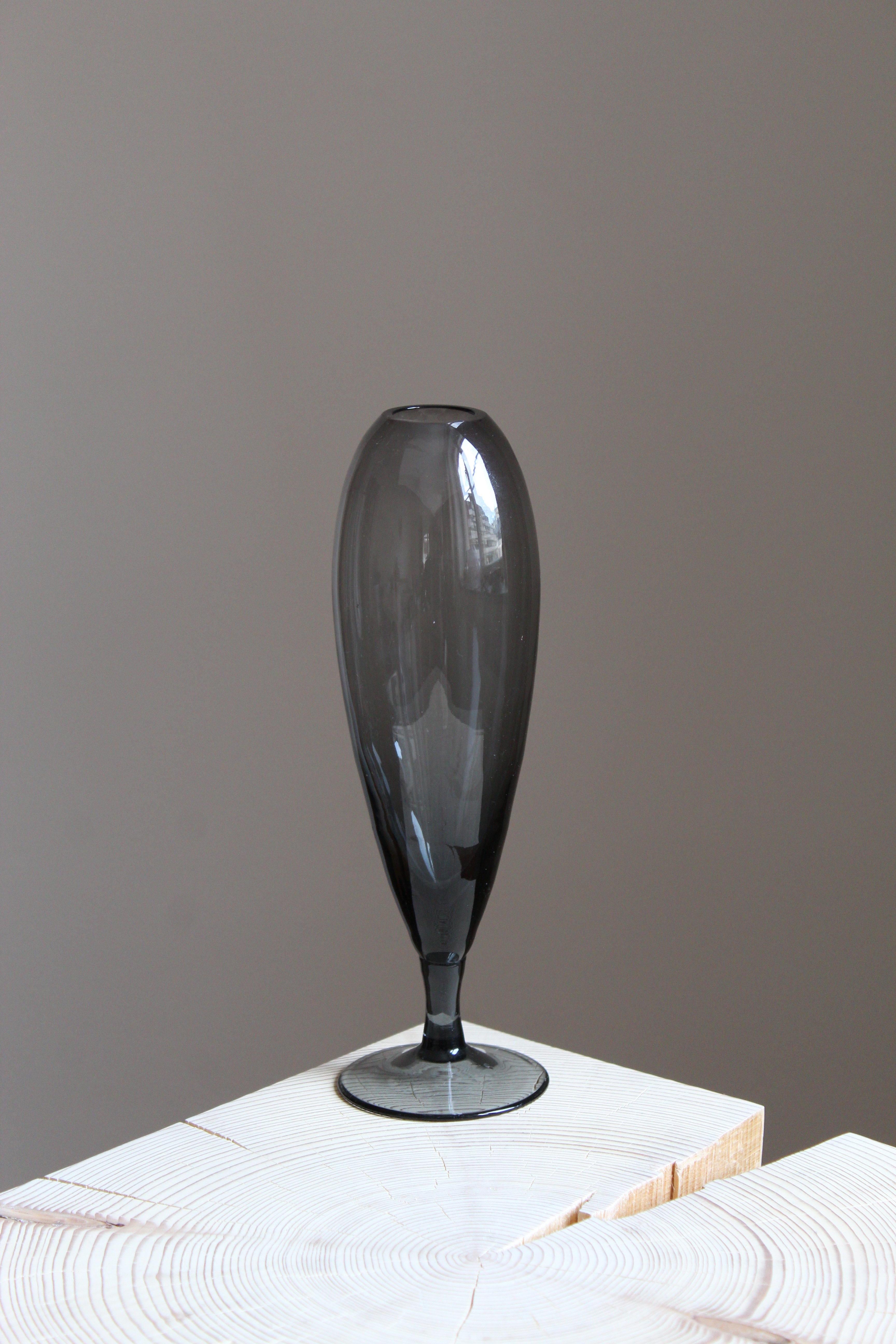 A vase / vessel. Designed by Wilhelm Wagenfeld. Produced by WMF, Germany, c. 1950s.
    
 