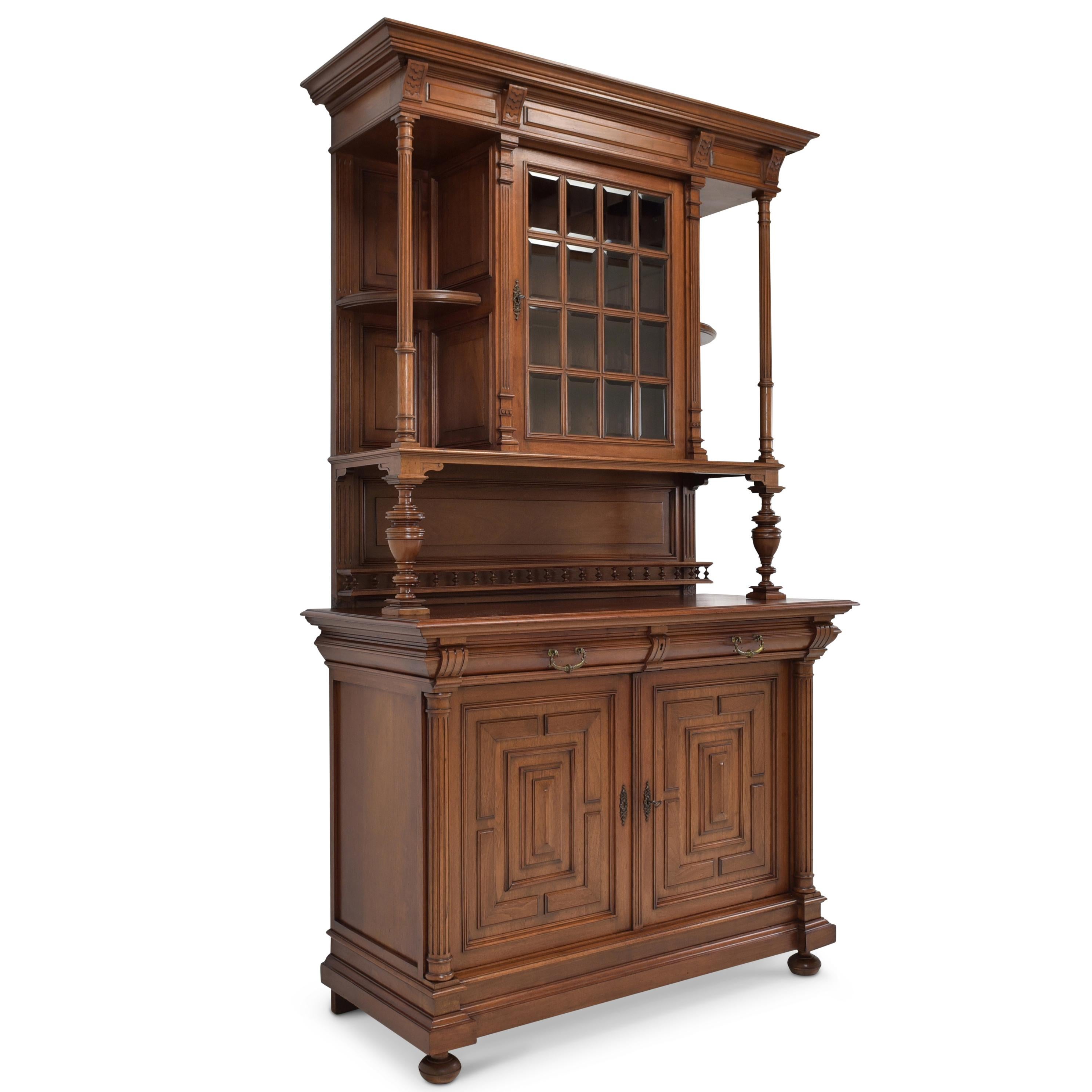 Buffet cabinet restored Wilhelminian style around 1900 solid walnut

Features:
Very high quality workmanship and Material quality
Drawers pronged
Original locks and fittings
Original 16-part faceted glazing
Shelves of the upper part are