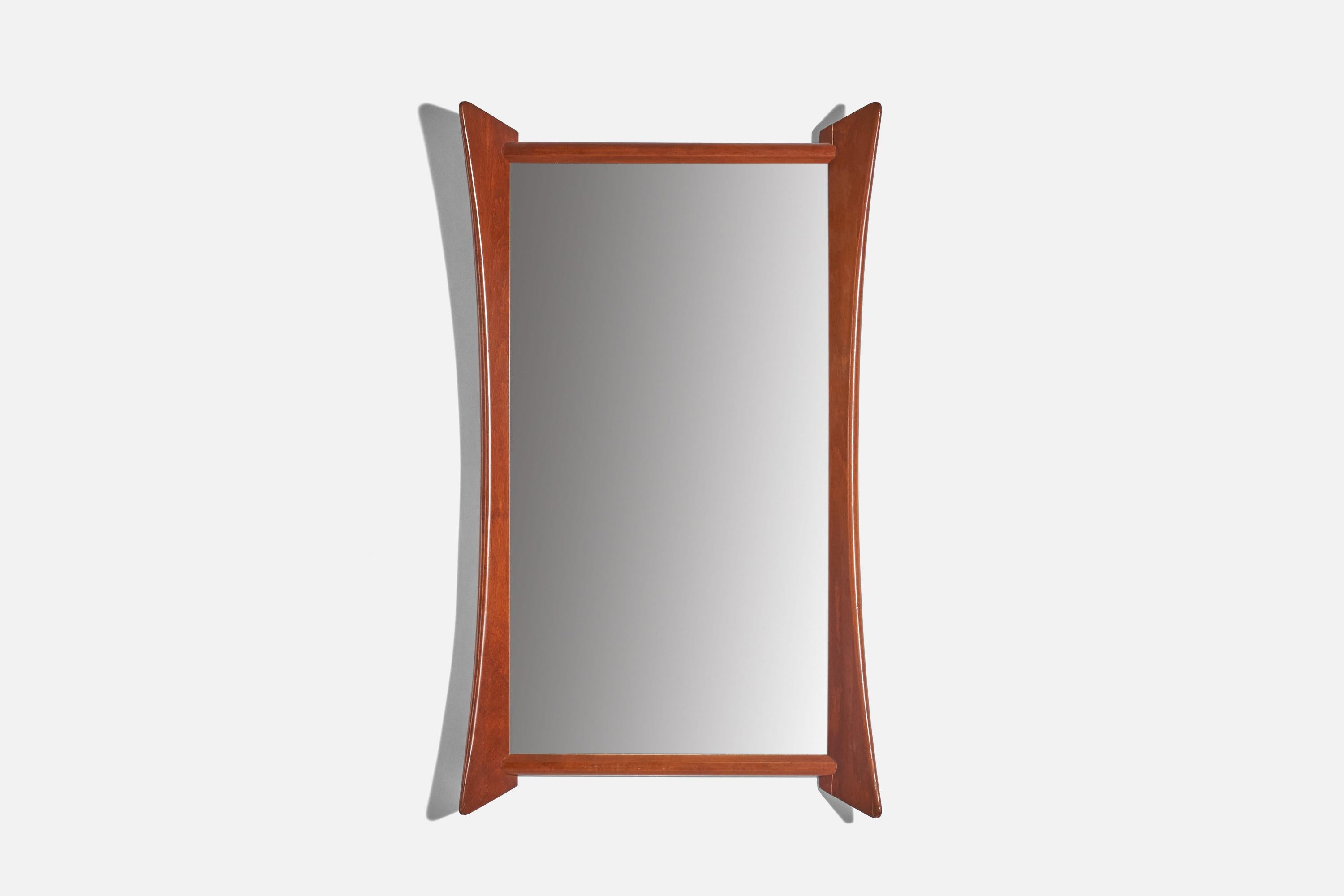 A solid teak wall mirror designed and produced by Wilkensons Ramfabrik, Göteborg, Sweden, 1950s.