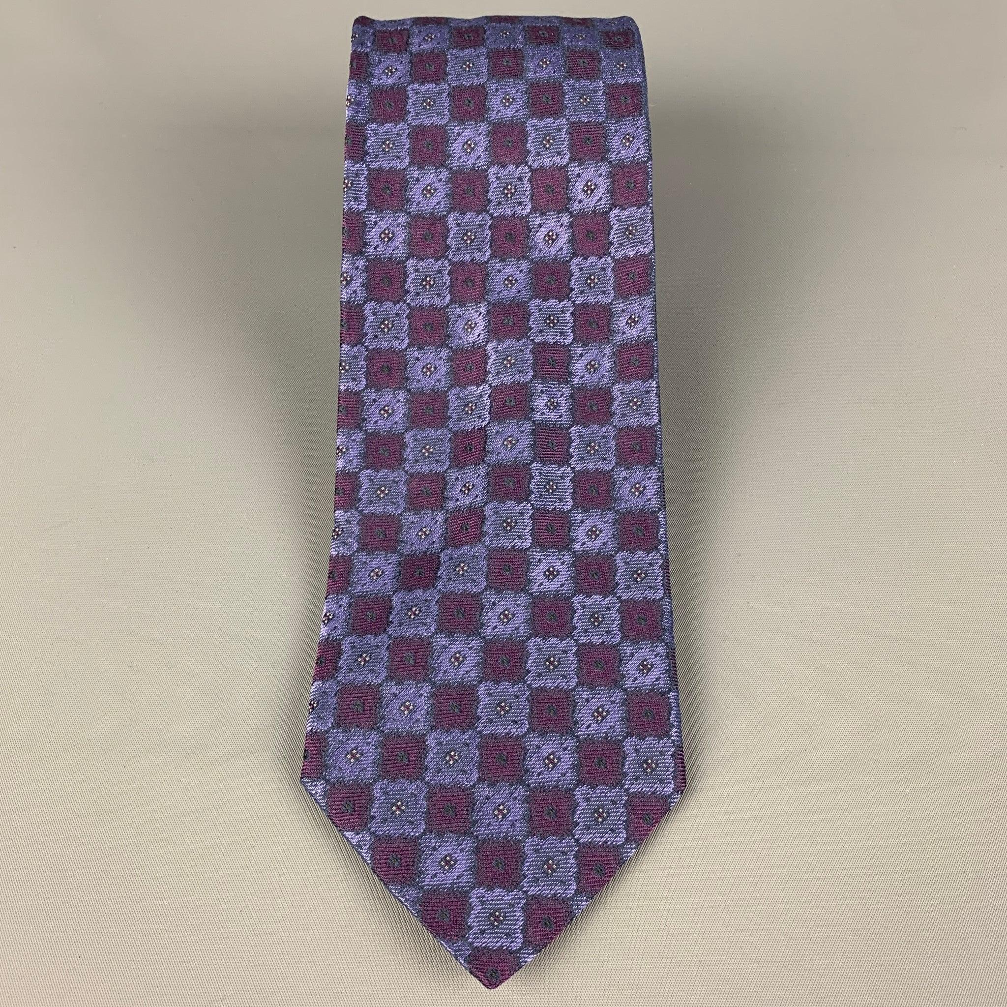 WILKES BASHFORD
necktie comes in a purple & burgundy silk with a all over square print. Made in Italy. Very Good Pre-Owned Condition.Width: 3.75 inches  Length: 62 inches 
  
  
 
Reference: 120417
Category: Tie
More Details
    
Brand:  WILKES