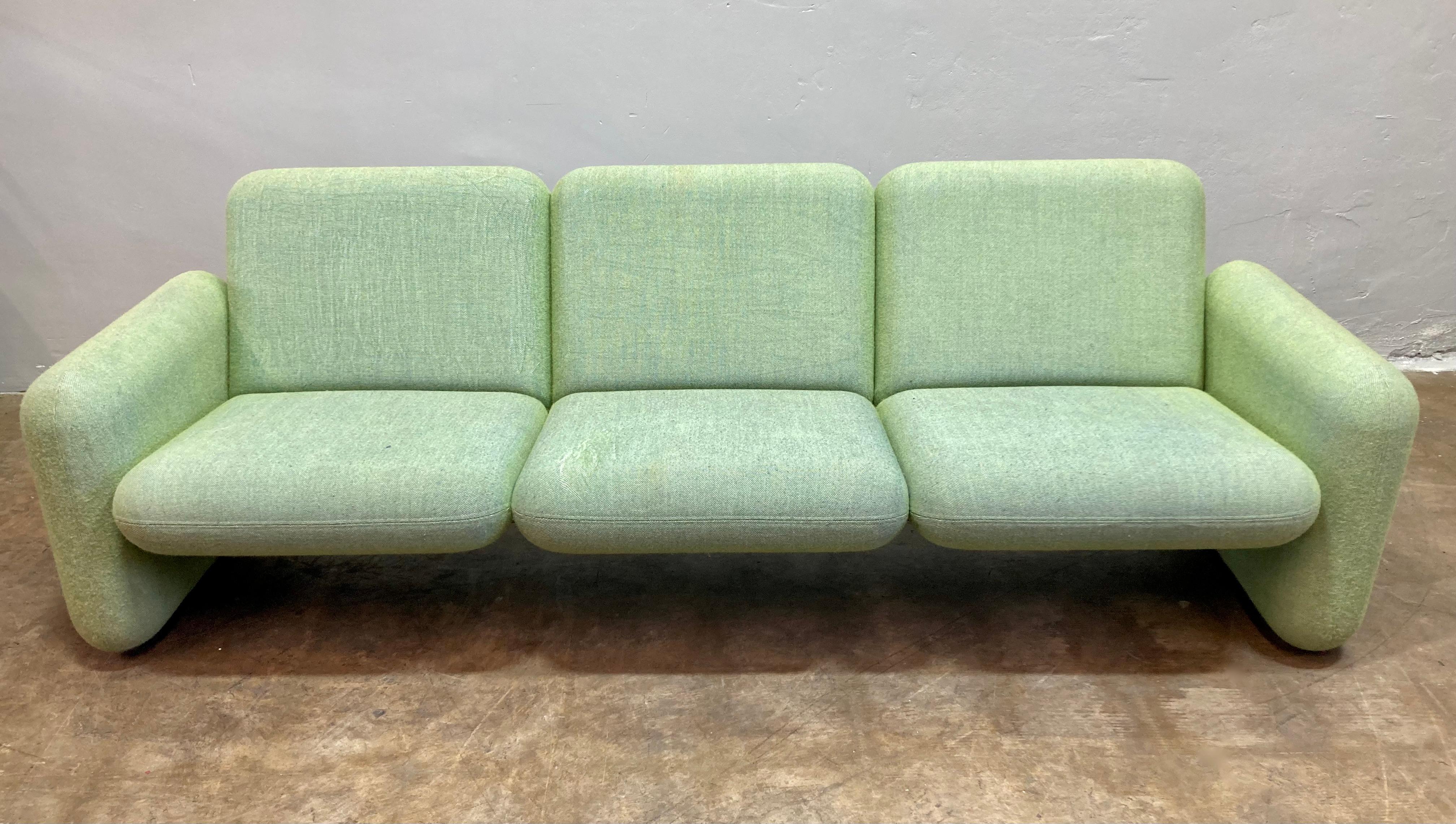 Designed by Ray Wilkes and first introduced in 1976, the Wilkes Modular Sofa is manufactured by Herman Miller. Seat and back are joined with steel brackets, and rounded cushions are firm and in incredible condition. Cushions are upholstered in the