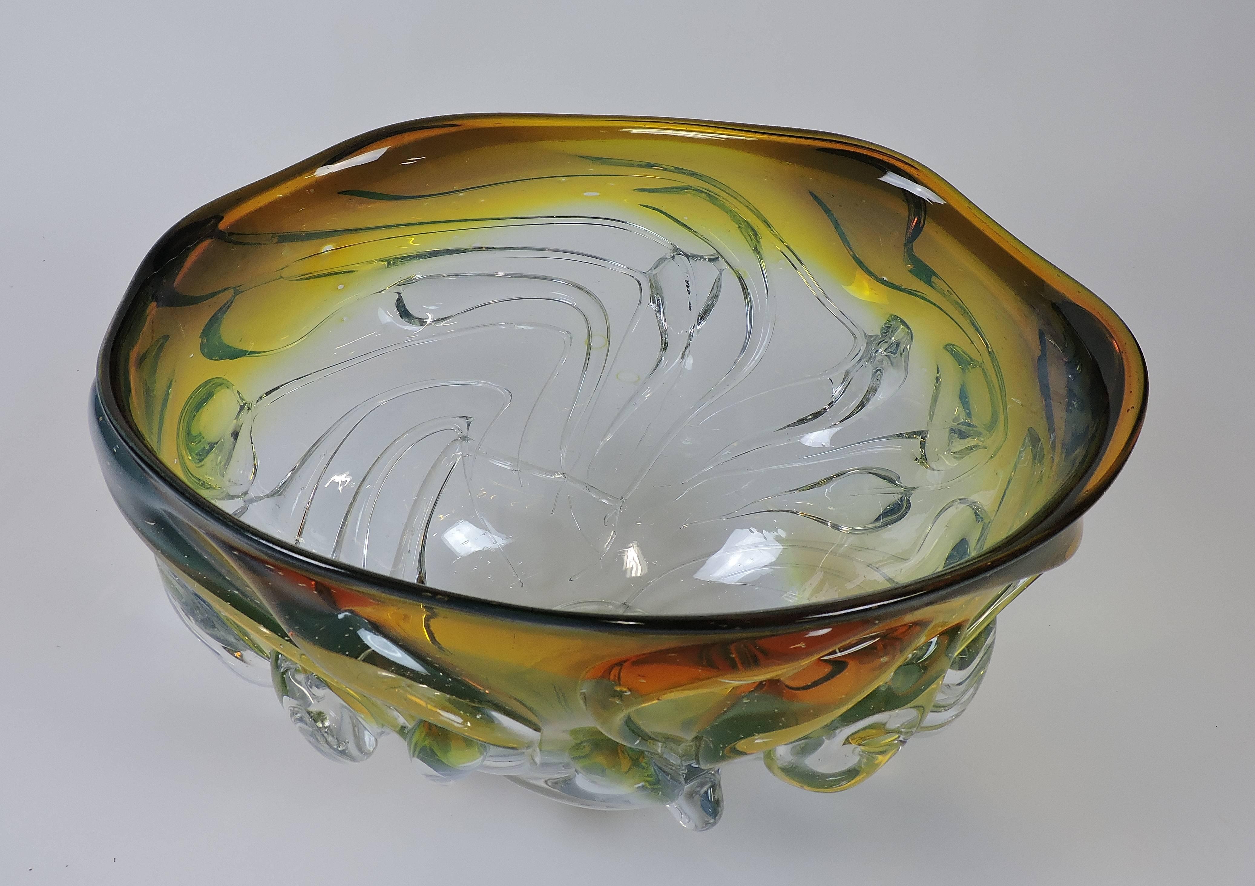 Striking monumental sized drip bowl hand blown by acclaimed glass artist, Will Dexter. This bowl is composed of thick rivulets of glass that give it a dynamic and organic look. Signed Dexter on the bottom. The last picture is to give an idea of