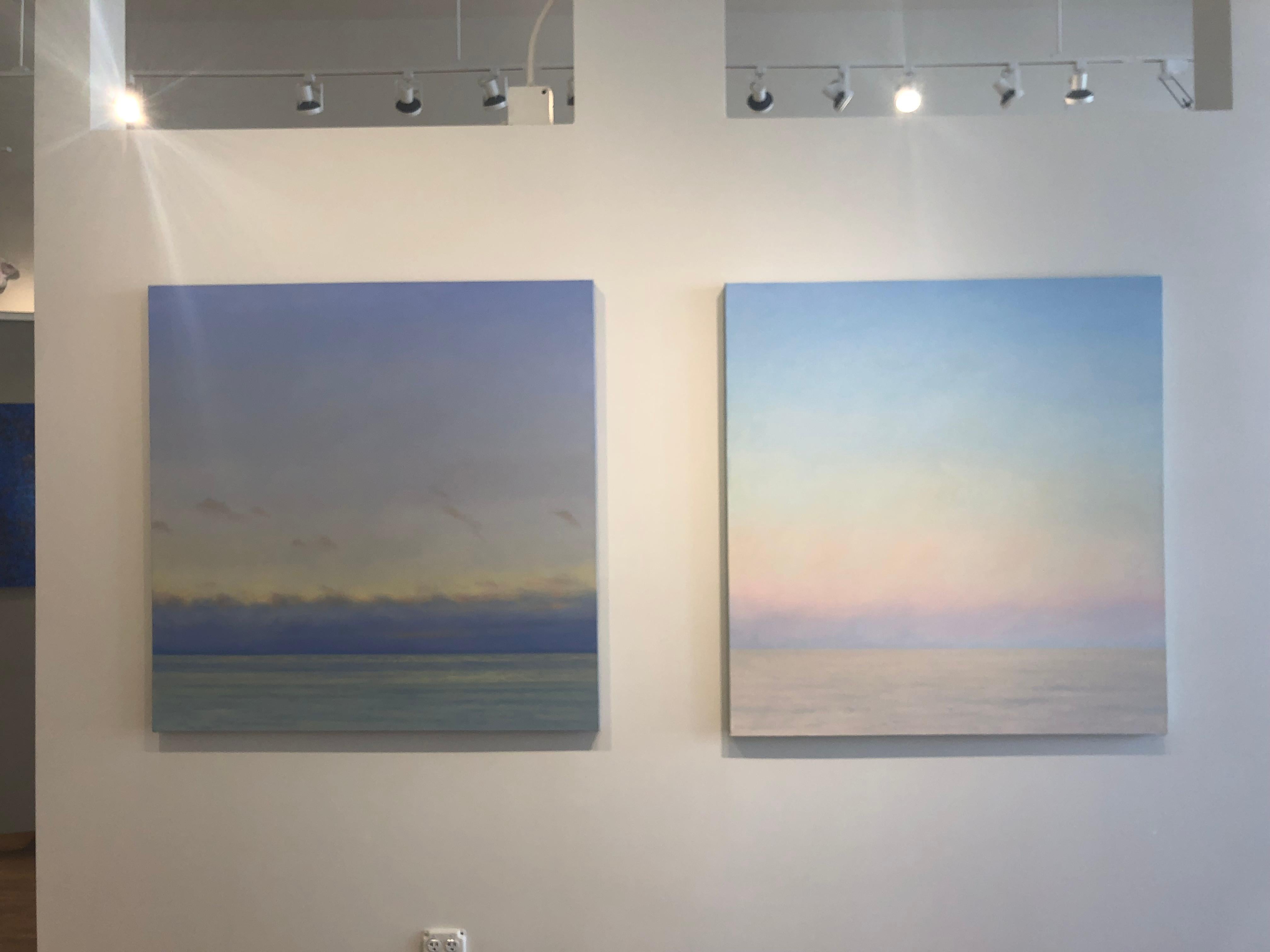Serene and calm sky, ocean horizon, sunrise or sunset sky painting from American Realist Willard Dixon. A contemporary sky scape with clouds and etherial  light. Like a window to a wide open, brilliant and warm sky, in blue, purple yellow and gold.