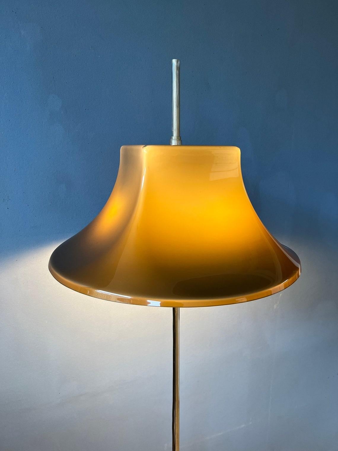 Very rare high quality space age floor lamp by Willem Hagoort with acrylic glass shade. The shade can be moved up and down the (heavy) base. The lamp requires two E27 lightbulbs and currently has an EU-plug (works outside EU with