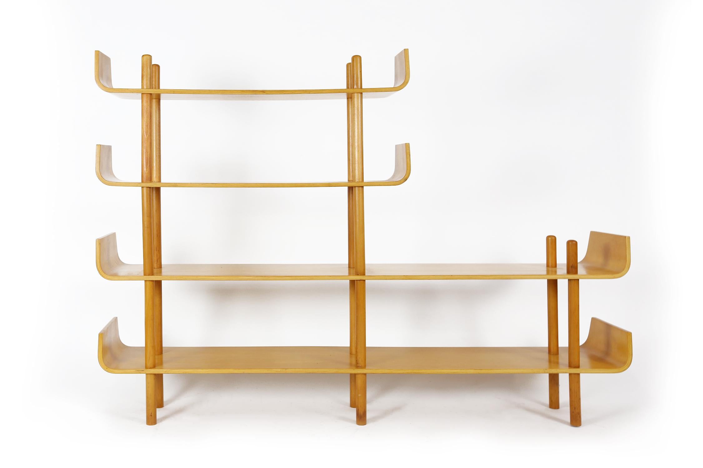 Bentwood shelving unit designed by Willem Lutjens for Gouda den Boer model number 545, from 1953. Wooden plywood beech shelving with beech sticks.
This nice light wood is easy to combine with other warm furniture from all over the globe. The nice