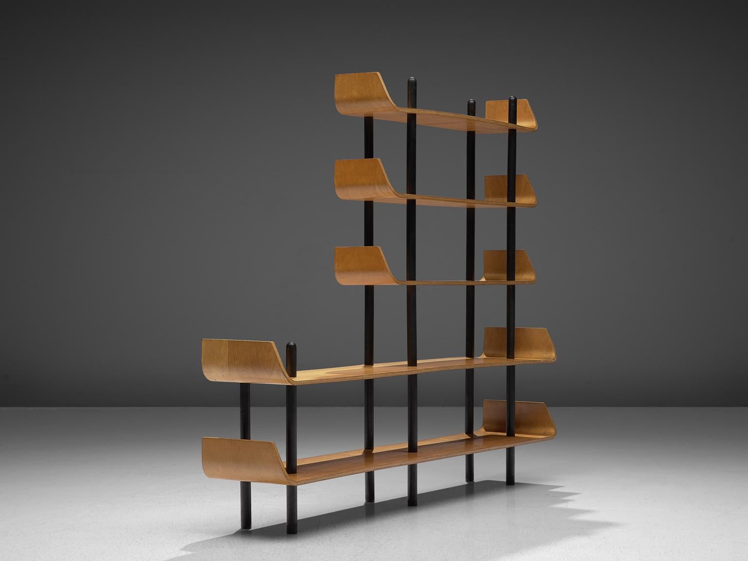 Willem Lutjes for Den Boer Gouda, bookcase, plywood, the Netherlands 1953.

Bookcase with five shelves in maple plywood. Each shelve has curved ends, characteristic for this design by Lutjens. Hold together by six black coated stands, which are in