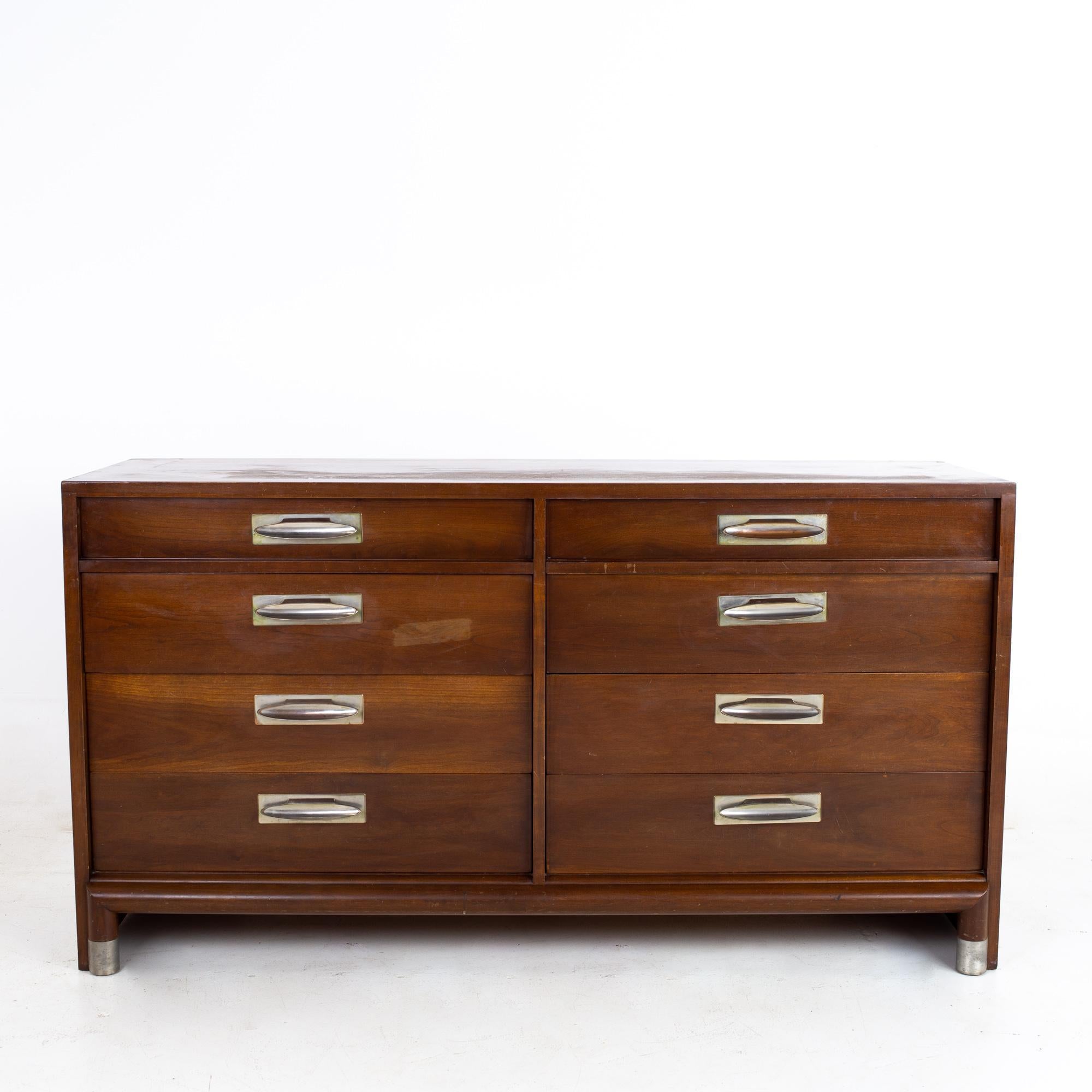Willett Furniture mid century walnut 8 drawer lowboy dresser

This dresser measures: 60 wide x 20.5 deep x 32 inches high

All pieces of furniture can be had in what we call restored vintage condition. That means the piece is restored upon