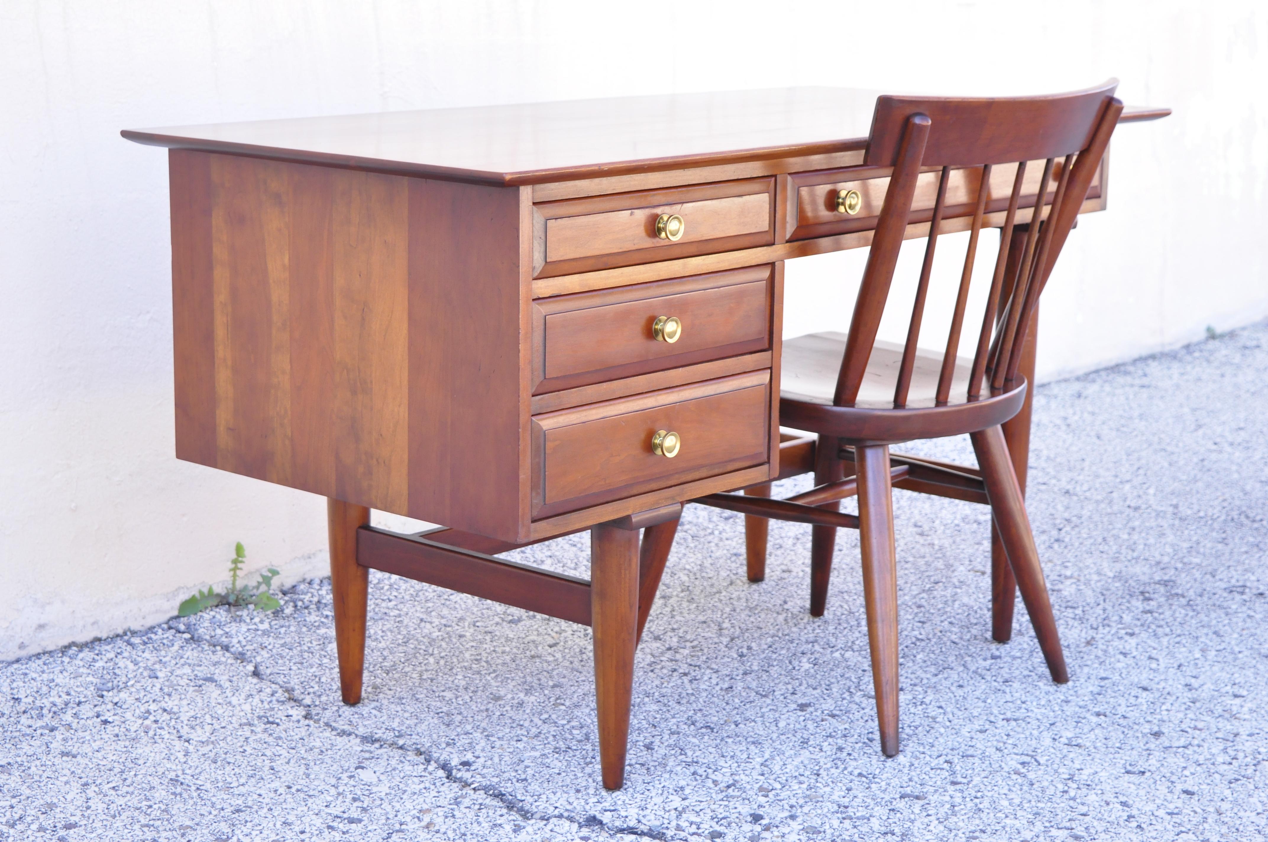 Willett transitional Mid-Century Modern cherry wood writing desk and side chair. Item features desk and chair included, solid wood construction, beautiful wood grain, finished back, original label, tapered legs, clean modernist lines, quality