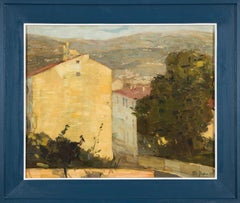 Vorstadthäuser in baumbestandener Straße