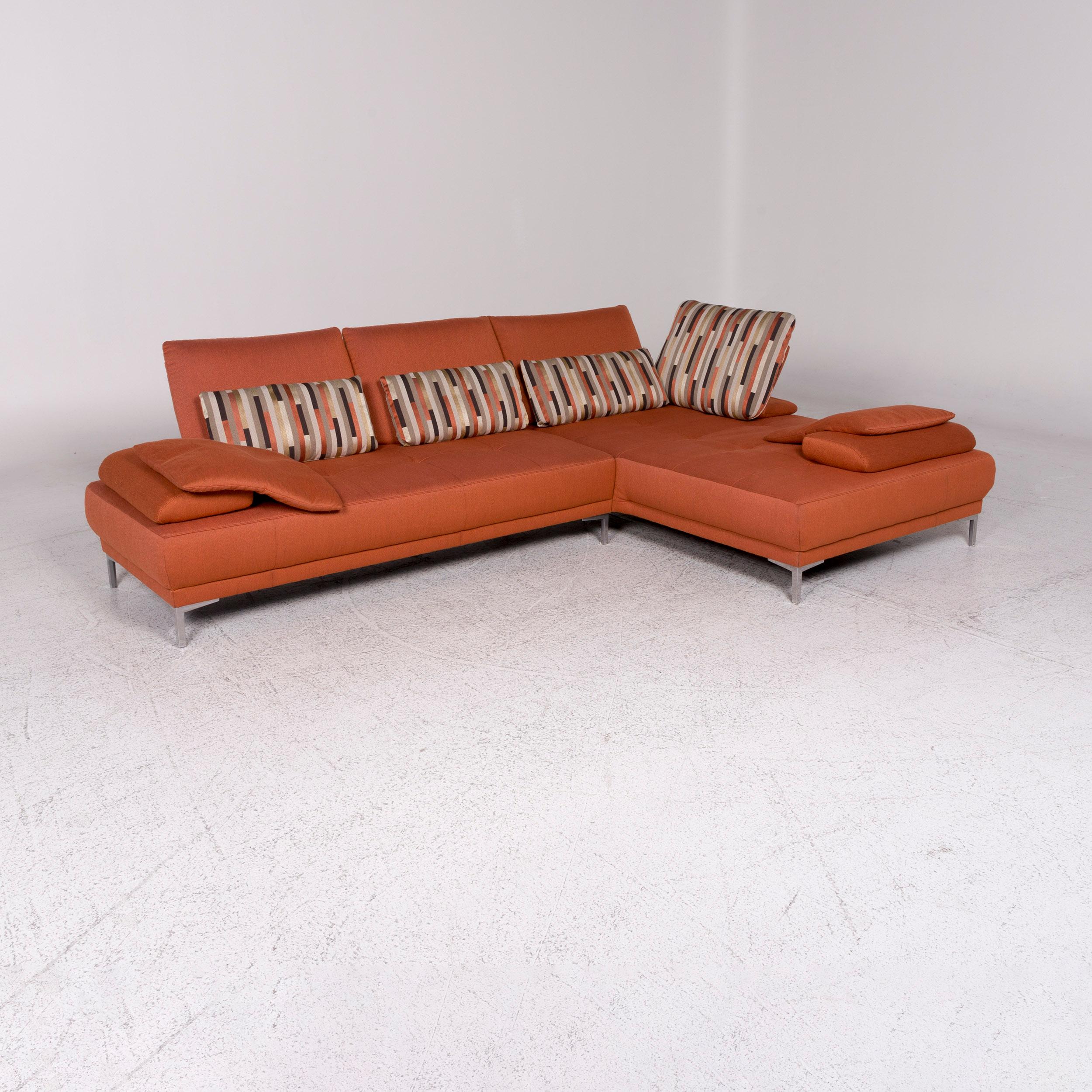We bring to you a Willi Schillig fabric sofa Orange corner sofa.
 
 Product measurements in centimeters:
 
 depth 94
 width 291
 height 83
 seat-height 41
 rest-height 53
 seat-depth 59
 seat-width 215
 back-height 42.

  