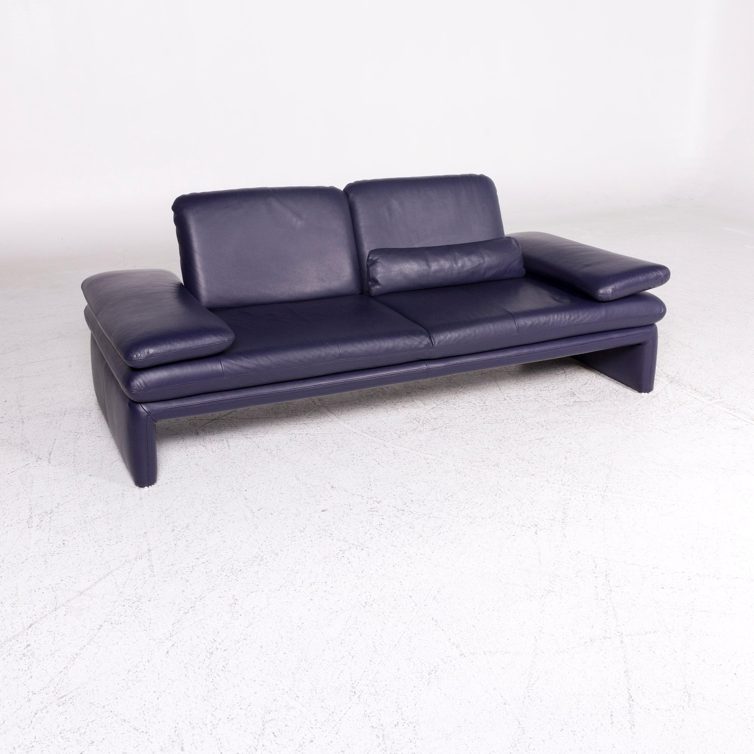 We bring to you a Willi Schillig leather sofa purple two-seat couch.

 Product measurements in centimeters:
 
 Depth 92
Width 215
Height 85
Seat-height 43
Rest-height 53
Seat-depth 56
Seat-width 143
Back-height 41.
 
    
