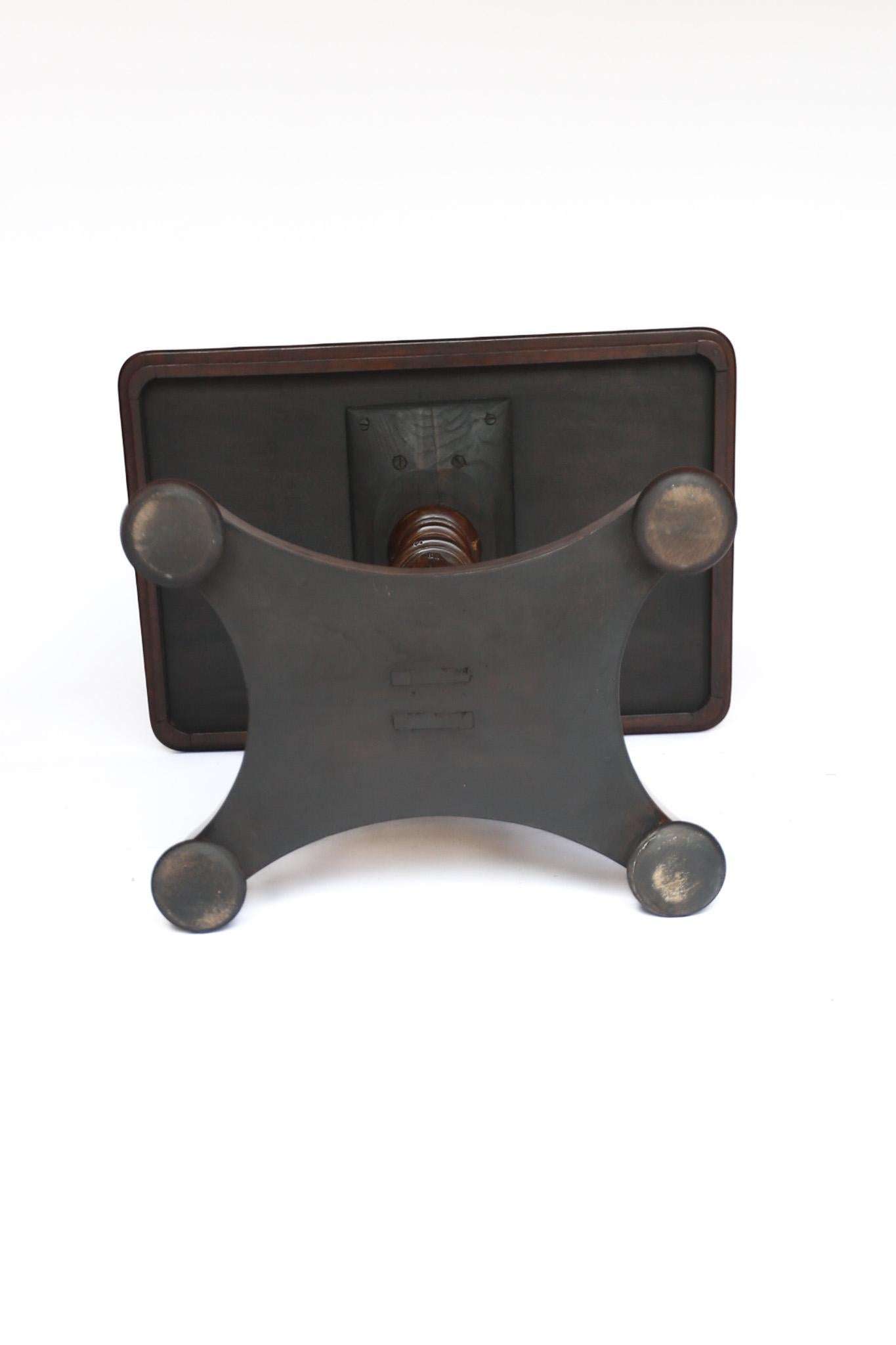 William 1V Period 1830-37 Mahogany Lamp Table
Rectangular top with thumb mould edge
Thin Mahogany Frieze
Turned & Tulip Carved Column
Quadruple Shaped Platform Base
With Turned Bun Shaped Feet
Recently Polished