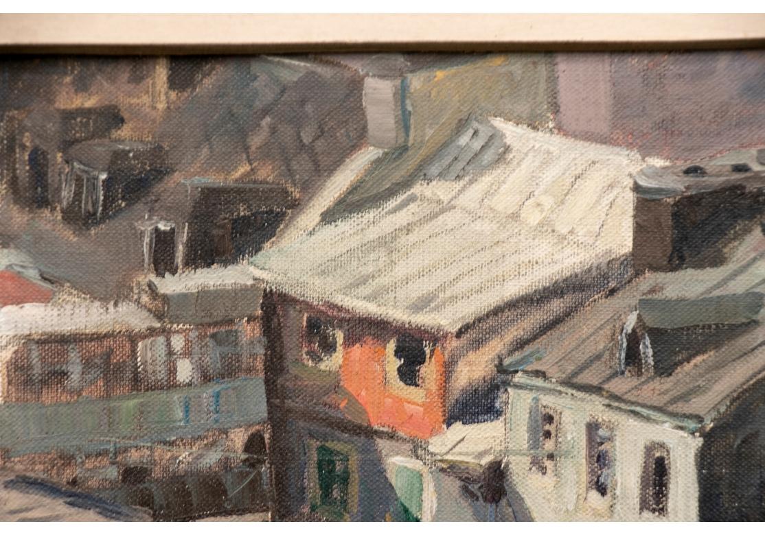 Oil on masonite depicting colorful city structures from an over-head view showing rooftops, clotheslines with laundry, figures on the sidewalk.
Signed lower right.
Presented in a gilt frame and painted fillet.
Dimensions:
Sight: 11 1/2