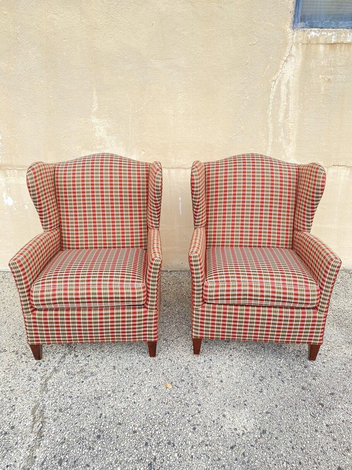William Alan Green & Red Plaid Wingback Lounge Arm Club Chairs - a Pair. Item features very nice solid frames, original green and red plaid upholstery, shapely wingbacks, solid wood legs, original labels, quality American craftsmanship, great style