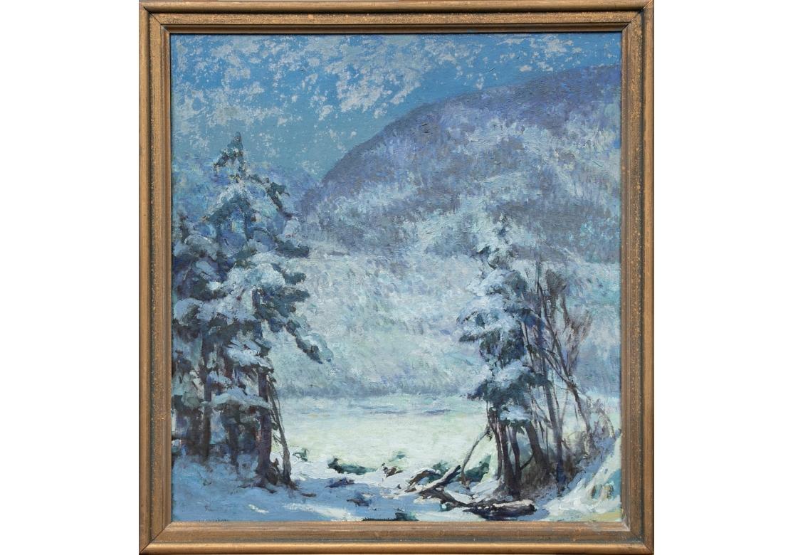 Unsigned, from the estate of the artist. A rustic  landscape with a snowfall on a snow covered lake and purple hills in the background. Two pine trees frame the scene in the foreground and all shown in cool blue tones in the late afternoon. 
art 26