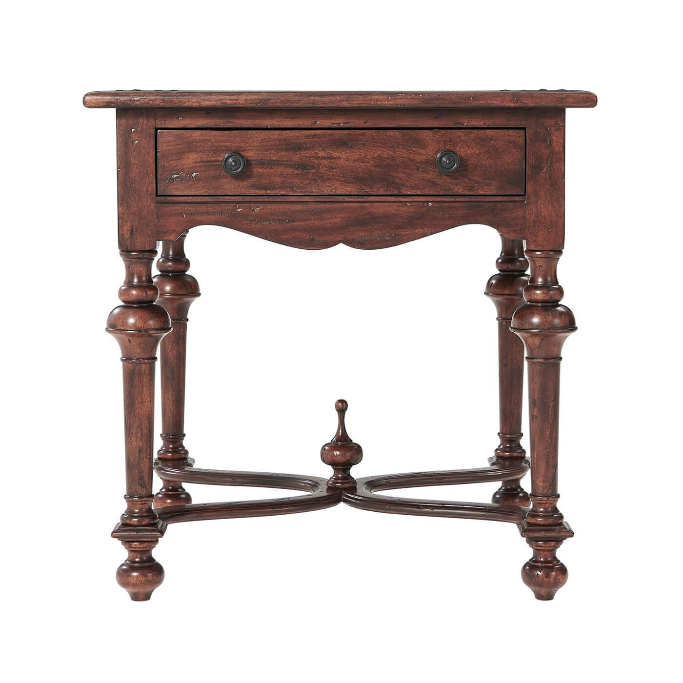 A William and Mary style antiqued wood end table, the square parquetry top above a drawer, and bell turned legs joined by a serpentine 'x' stretcher. 

Dimensions: 26